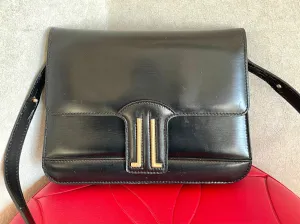 Vintage Lanvin black leather shoulder bag with iconic golden logo motif, Classic purse for daily use. 050222ya1