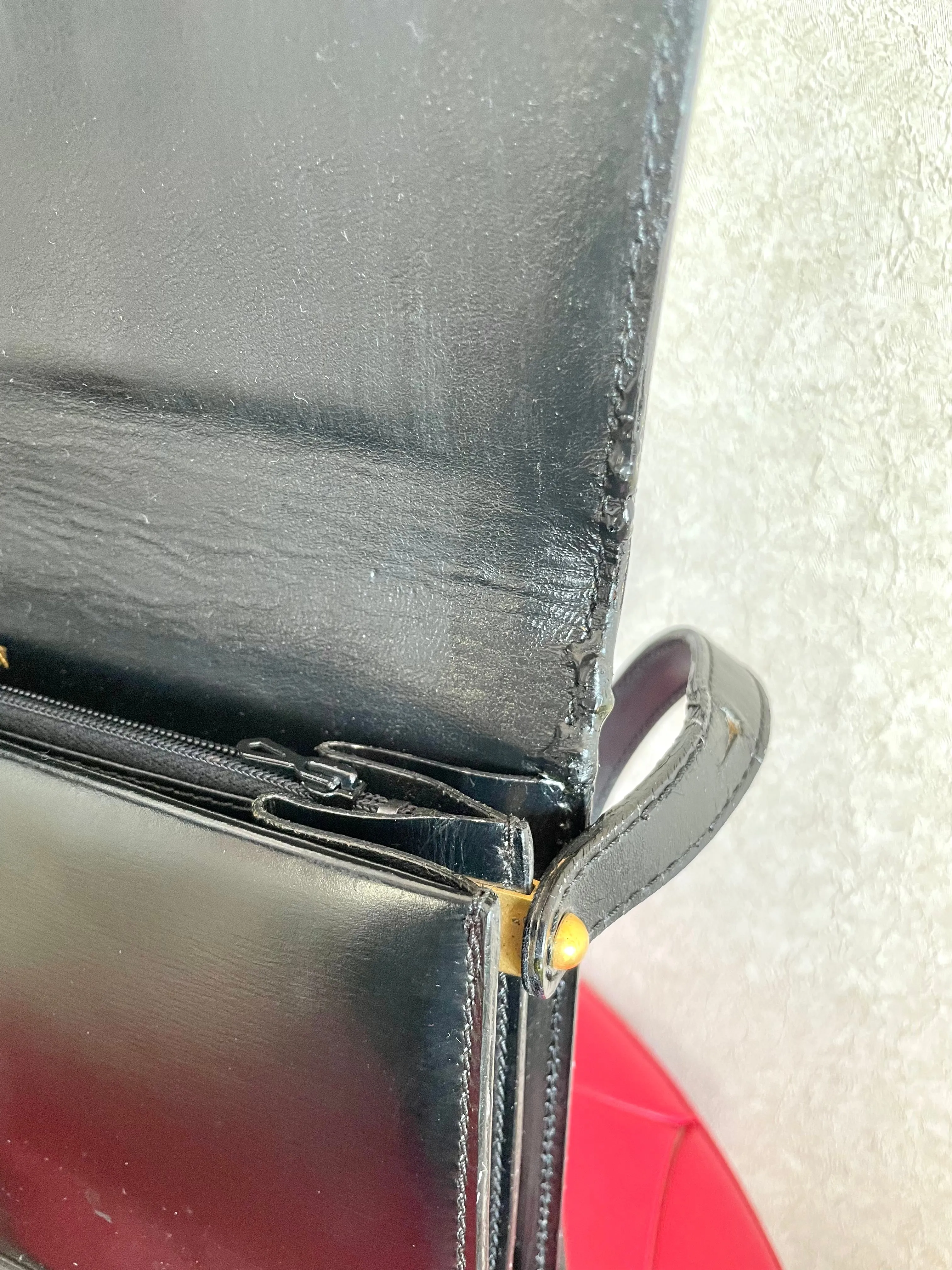 Vintage Lanvin black leather shoulder bag with iconic golden logo motif, Classic purse for daily use. 050222ya1