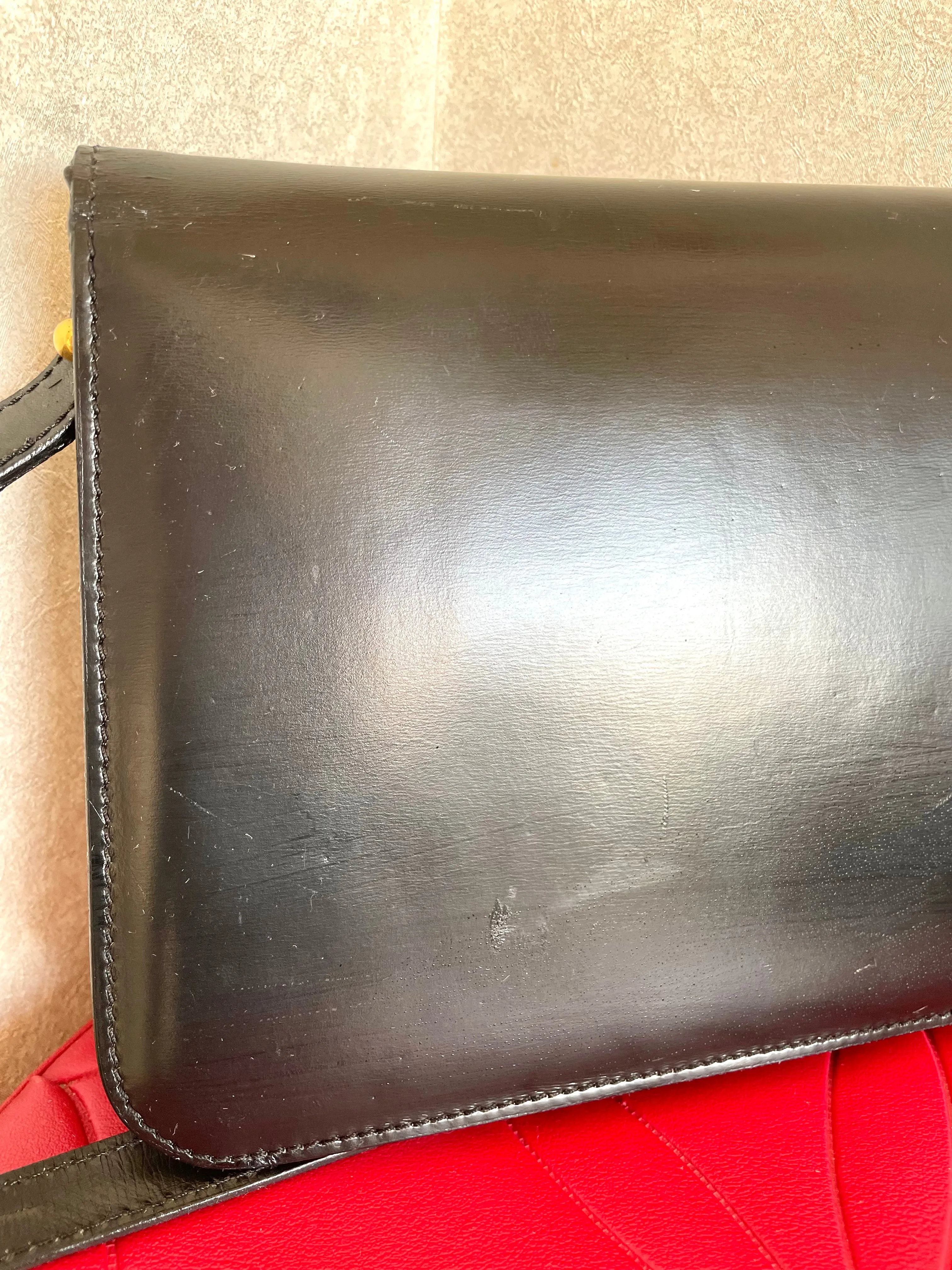 Vintage Lanvin black leather shoulder bag with iconic golden logo motif, Classic purse for daily use. 050222ya1