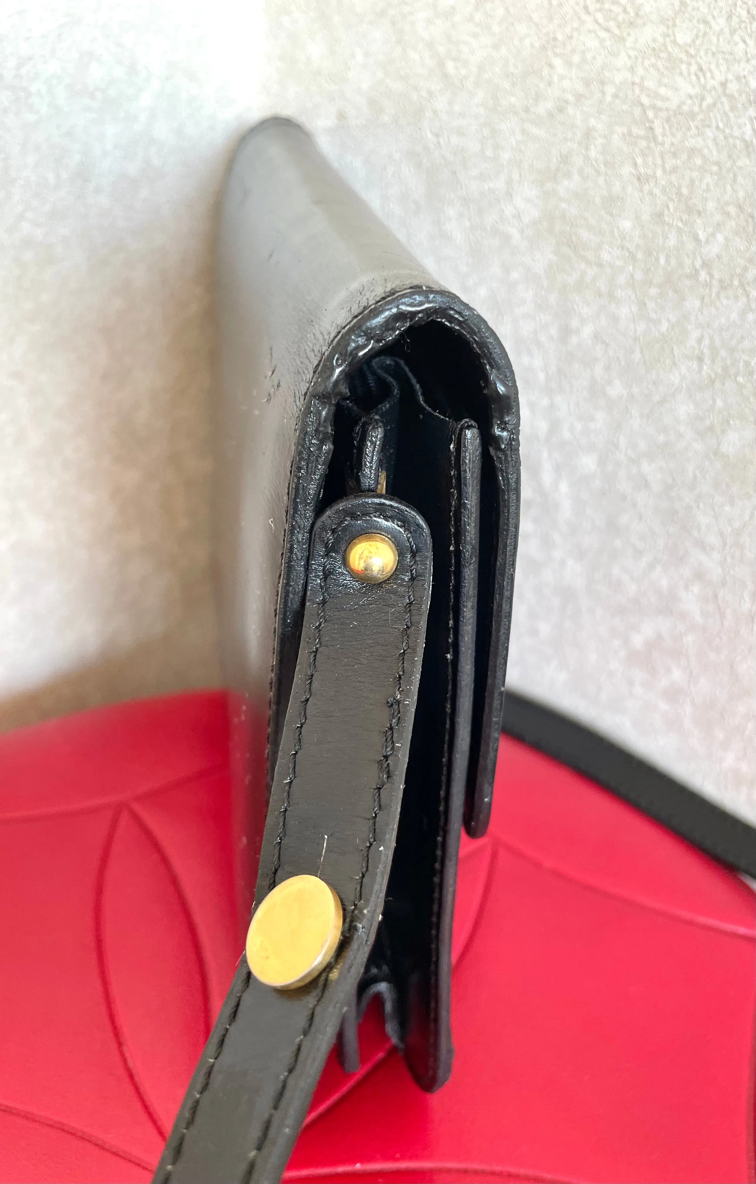 Vintage Lanvin black leather shoulder bag with iconic golden logo motif, Classic purse for daily use. 050222ya1