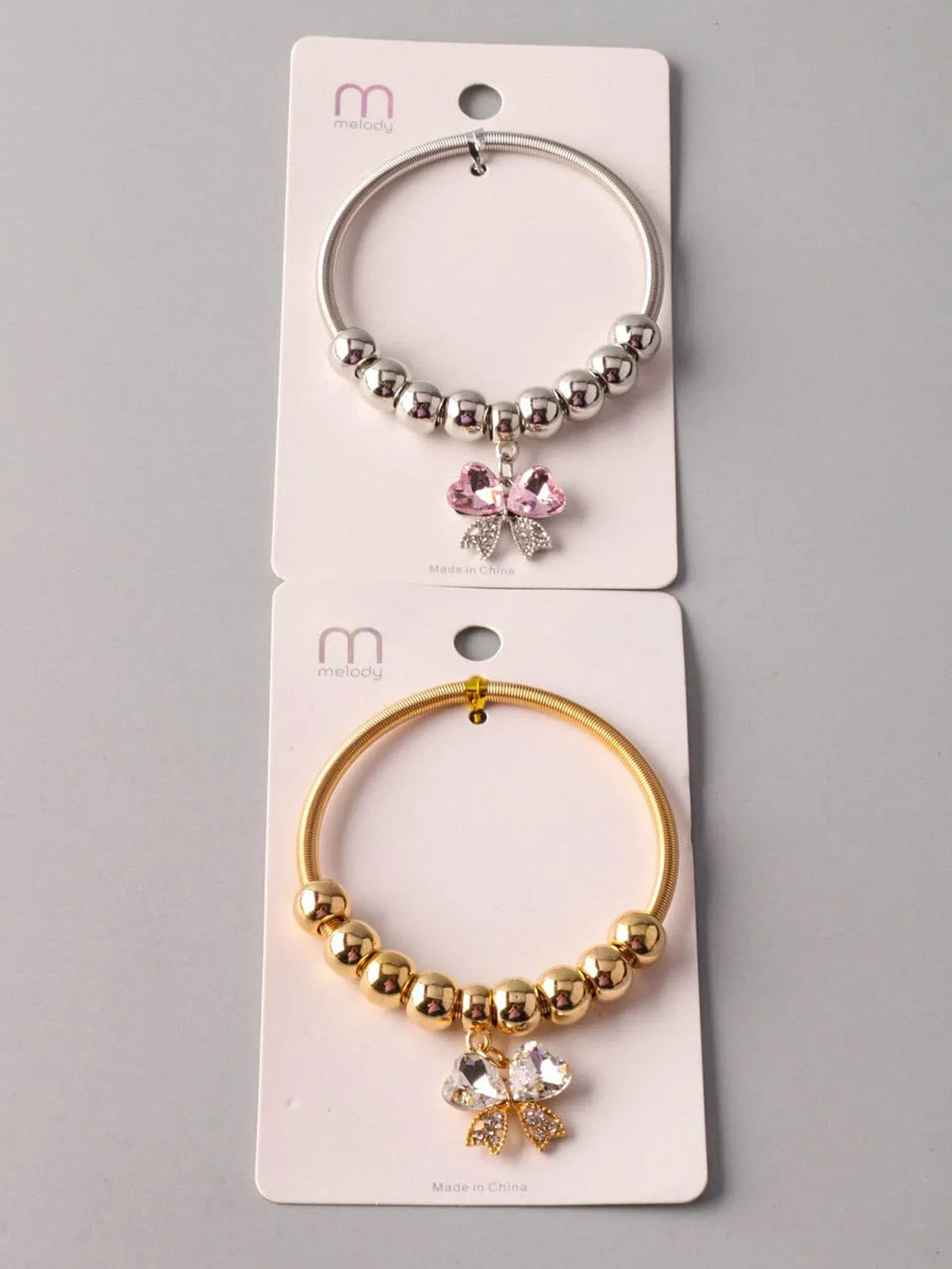 WOMEN'S FASHION GOLD & SILVER BOWS BRACELET